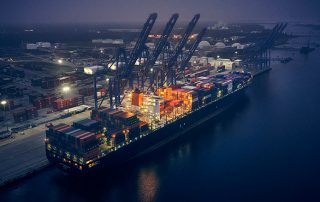 Shipping Vessel in Harbor at Night
